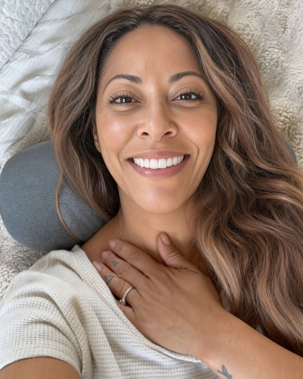 Customer relaxing with the CervaRest under her neck